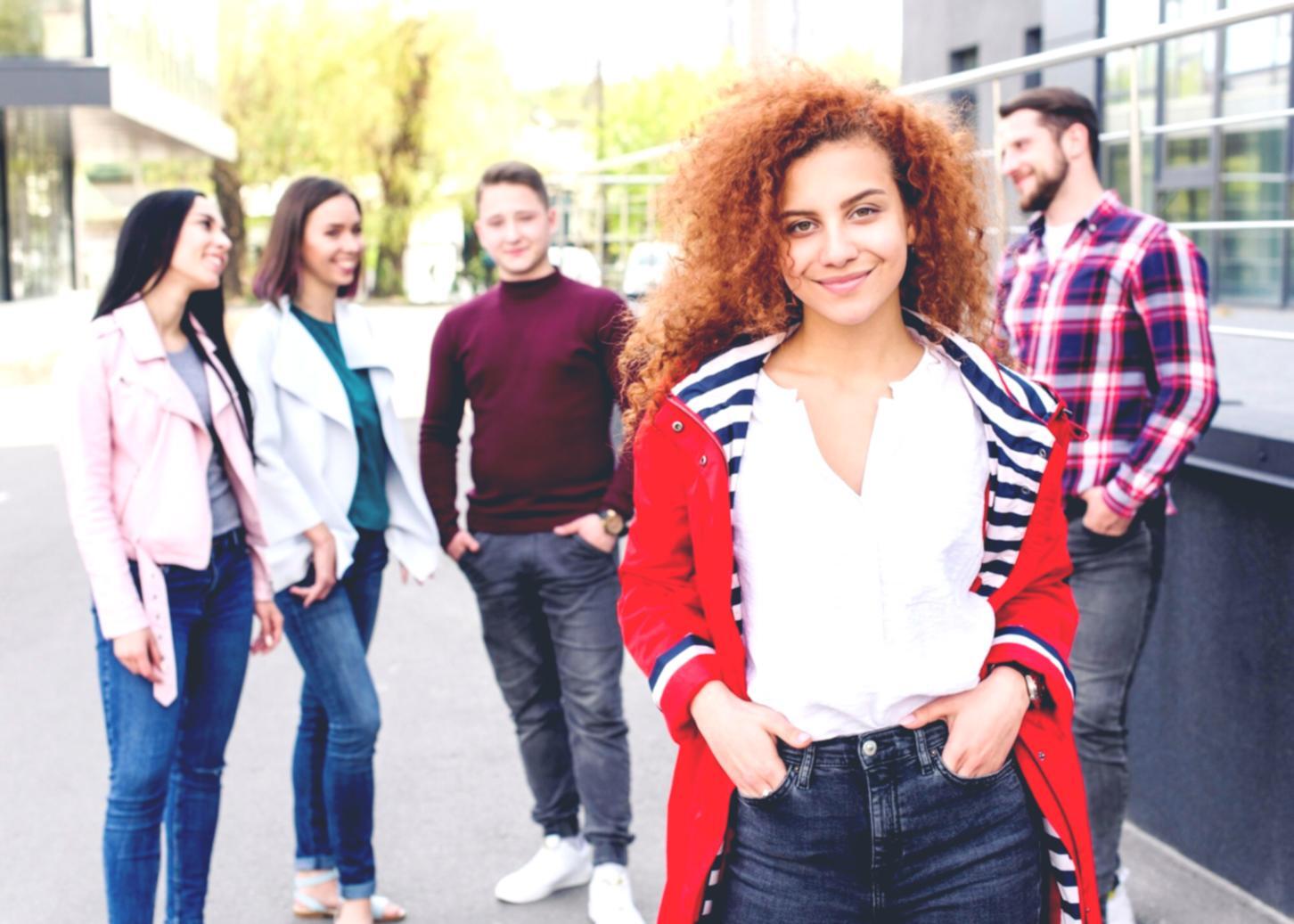 Student analyzing charts during trading session